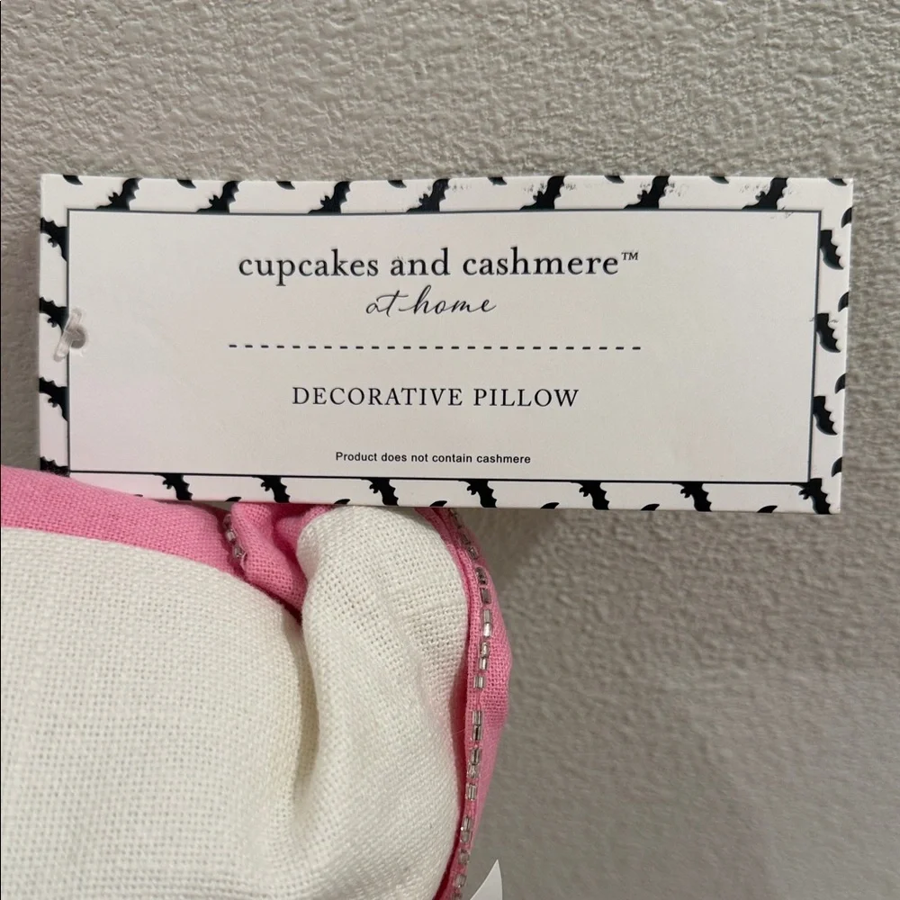 Cupcakes & Cashmere Skeleton Holiday Pillow - Pink and White